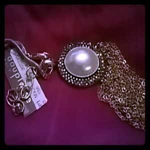 Beautiful gold tassel necklace.